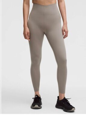 Lululemon Glow Up Super-High-Rise Tight 25"
Warm Ash Grey size 6 NWT
